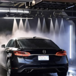 A modern touchless car wash in action, showcasing water jets cleaning a vehicle efficiently and eco-consciously